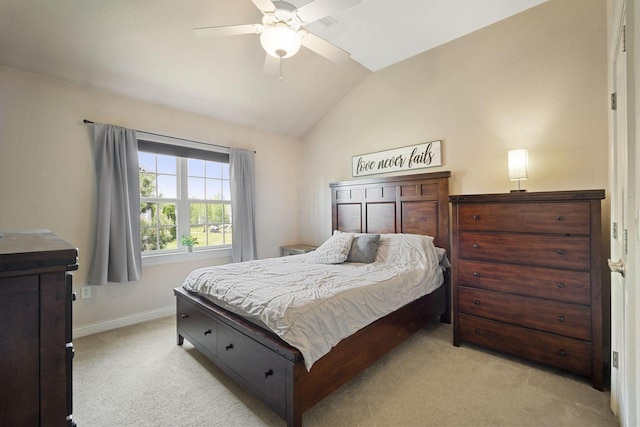 1820 Stoney Ln, Slinger, WI 53086 - bedroom featuring light colored carpet, vaulted ceiling, baseboards, and a ceiling fan