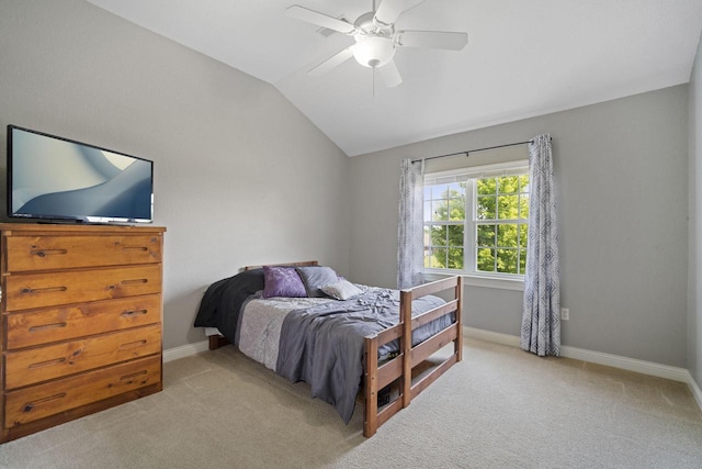 1820 Stoney Ln, Slinger, WI 53086 - bedroom featuring vaulted ceiling, light carpet, baseboards, and a ceiling fan