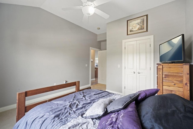 1820 Stoney Ln, Slinger, WI 53086 - carpeted bedroom featuring lofted ceiling, a closet, baseboards, and ceiling fan