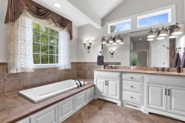 4205 Quarry Springs Dr, Racine, WI 53405 - full bathroom featuring double vanity, a garden tub, and lofted ceiling