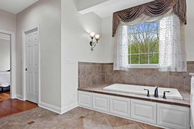 4205 Quarry Springs Dr, Racine, WI 53405 - full bathroom featuring a bath, baseboards, and tile patterned floors