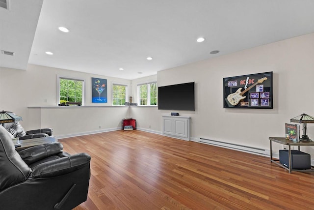 4205 Quarry Springs Dr, Racine, WI 53405 - living area featuring baseboard heating, wood finished floors, recessed lighting, and baseboards