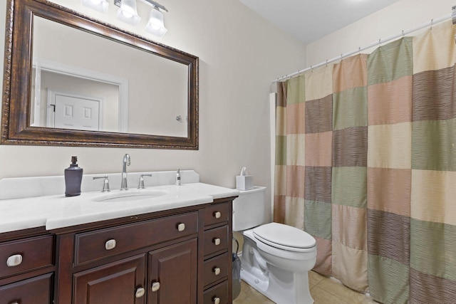 4205 Quarry Springs Dr, Racine, WI 53405 - full bath featuring vanity, toilet, tile patterned flooring, and a shower with curtain
