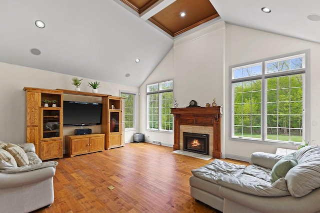 4205 Quarry Springs Dr, Racine, WI 53405 - living room with light wood-style flooring, high vaulted ceiling, a fireplace with flush hearth, recessed lighting, and beam ceiling