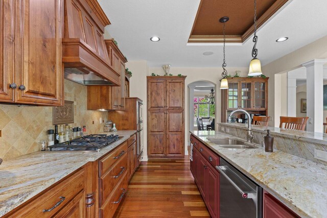 4205 Quarry Springs Dr, Racine, WI 53405 - kitchen featuring a sink, appliances with stainless steel finishes, a raised ceiling, dark wood finished floors, and recessed lighting