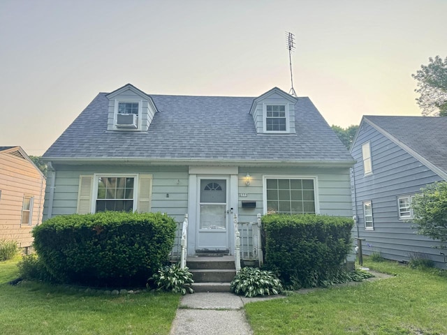 2773 N 87th St, Milwaukee, WI 53222 - cape cod-style house featuring a front yard and roof with shingles