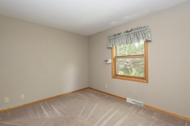 1915 Bonnie Ln, Waukesha, WI 53188 - unfurnished room with baseboards and light carpet
