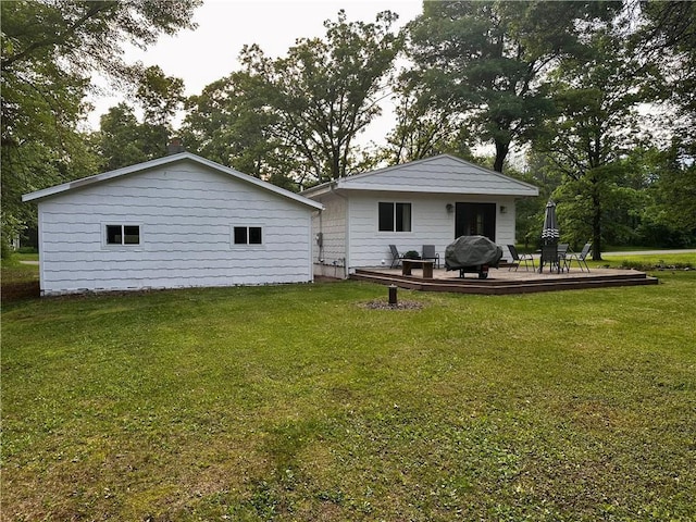 20454 70th Ave, Chippewa Falls, WI 54729 - rear view of house featuring a wooden deck and a yard