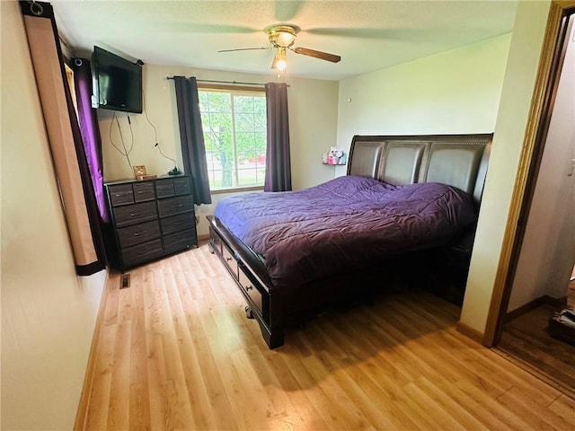 W14440 Culver Ave, Weyerhaeuser, WI 54895 - bedroom featuring light wood-type flooring and a ceiling fan