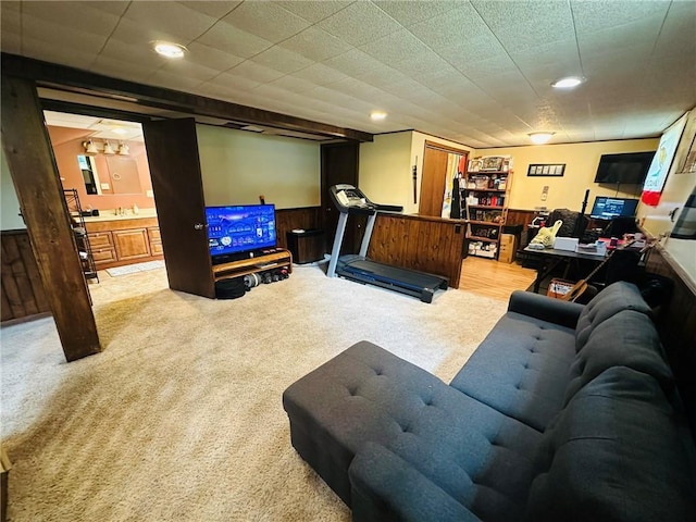 W14440 Culver Ave, Weyerhaeuser, WI 54895 - carpeted living room with a wainscoted wall, wooden walls, and recessed lighting