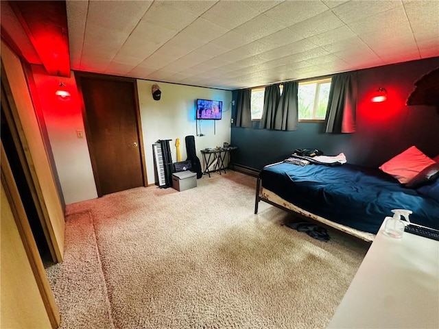 W14440 Culver Ave, Weyerhaeuser, WI 54895 - carpeted bedroom with a baseboard heating unit