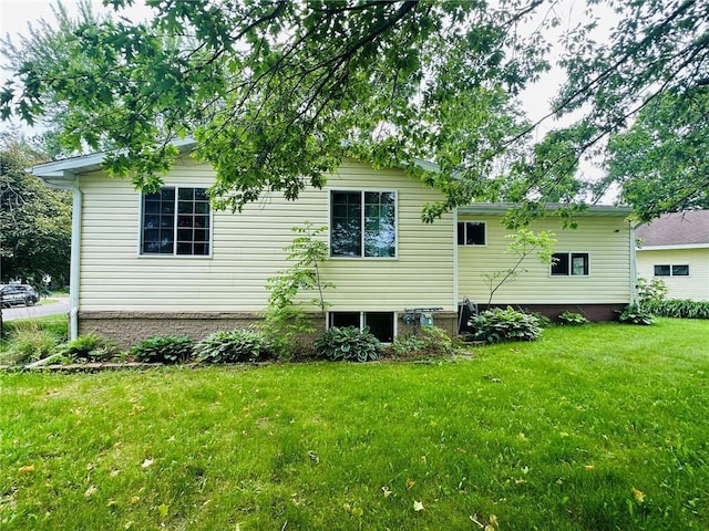 W14440 Culver Ave, Weyerhaeuser, WI 54895 - rear view of property with a yard