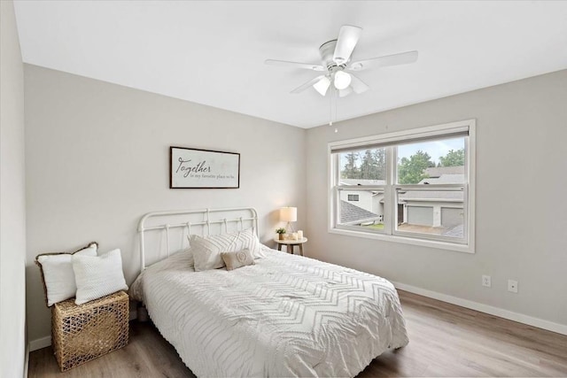 1109 Mckenna Blvd Unit G, Madison, WI 53719 - bedroom with wood finished floors and ceiling fan