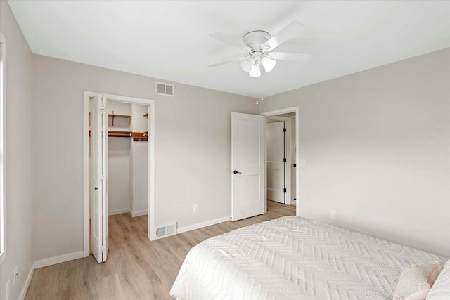 1109 Mckenna Blvd Unit G, Madison, WI 53719 - bedroom with light wood-style flooring, a walk in closet, a closet, and ceiling fan