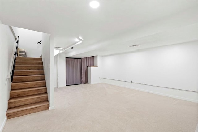 1109 Mckenna Blvd Unit G, Madison, WI 53719 - finished basement with stairway and light colored carpet