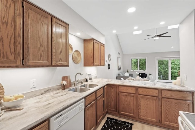 1109 Mckenna Blvd Unit G, Madison, WI 53719 - kitchen featuring dishwasher, vaulted ceiling, a ceiling fan, brown cabinetry, and recessed lighting