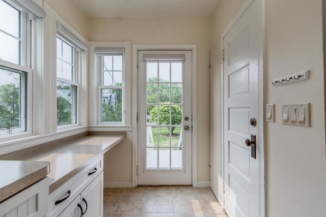 5230 Harbor Ct, Madison, WI 53705 - entryway with light tile patterned flooring and baseboards