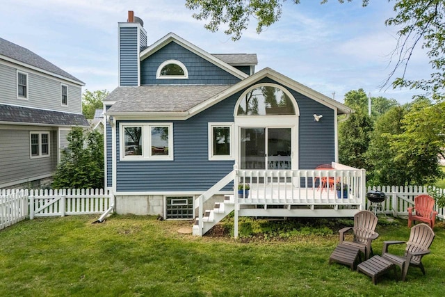 5230 Harbor Ct, Madison, WI 53705 - back of property featuring a chimney, a shingled roof, and a deck