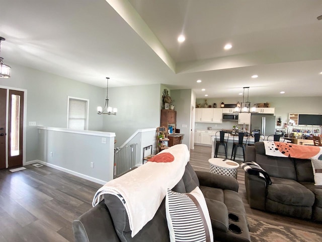 110 Grand St, Highland, WI 53543 - living room with dark wood-style floors, a chandelier, recessed lighting, and baseboards