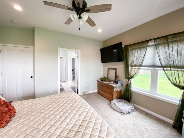 110 Grand St, Highland, WI 53543 - carpeted bedroom with baseboards, recessed lighting, and a ceiling fan