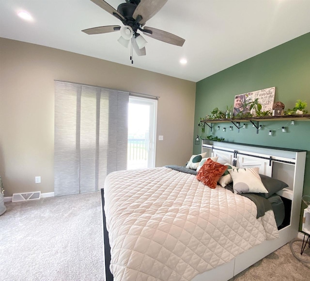 110 Grand St, Highland, WI 53543 - carpeted bedroom with access to outside, ceiling fan, recessed lighting, and baseboards