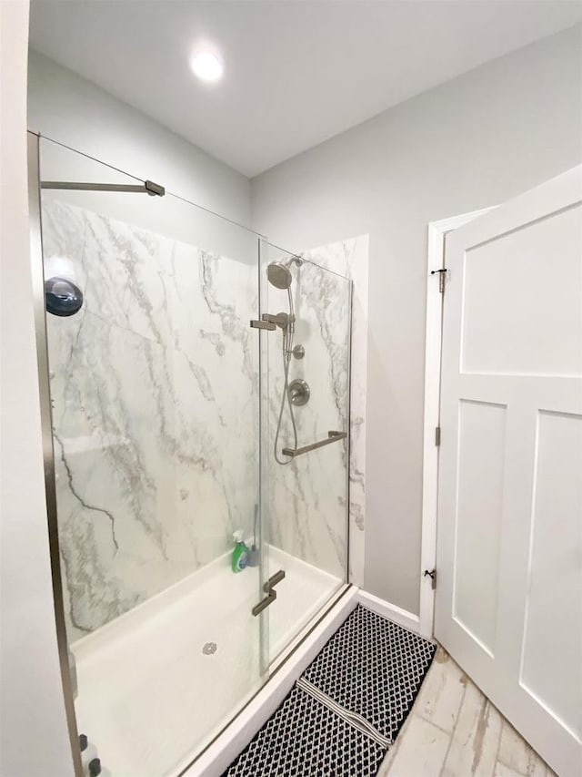 110 Grand St, Highland, WI 53543 - full bathroom featuring a marble finish shower and marble finish floors