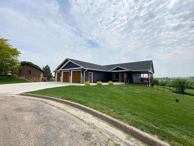 110 Grand St, Highland, WI 53543 - single story home featuring driveway, an attached garage, a front yard, and a porch