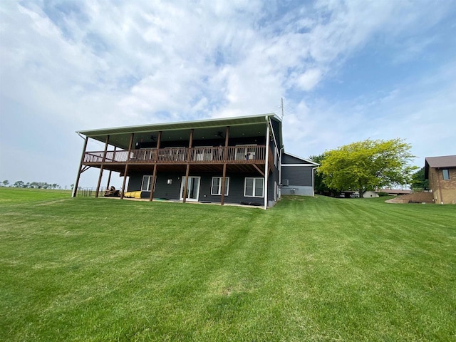 110 Grand St, Highland, WI 53543 - back of property with a wooden deck and a lawn