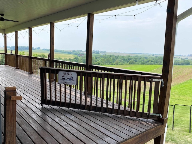 110 Grand St, Highland, WI 53543 - deck featuring a rural view and a ceiling fan