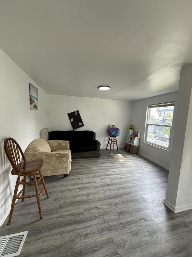 2667 N 36th St, Milwaukee, WI 53210 - sitting room with wood finished floors and baseboards