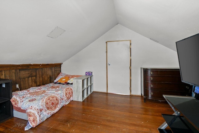 324 N Lincoln Ave, Beaver Dam, WI 53916 - bedroom with lofted ceiling and hardwood / wood-style flooring