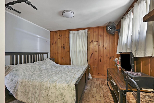 2518 Borg Rd, Delavan, WI 53115 - bedroom featuring hardwood / wood-style floors, crown molding, and wood walls