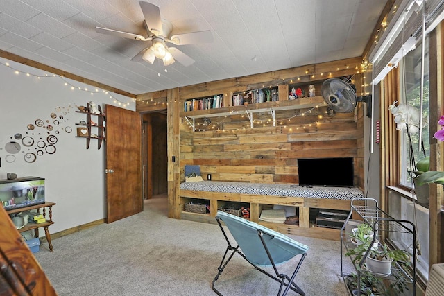 2518 Borg Rd, Delavan, WI 53115 - carpeted home office featuring wood walls and ceiling fan