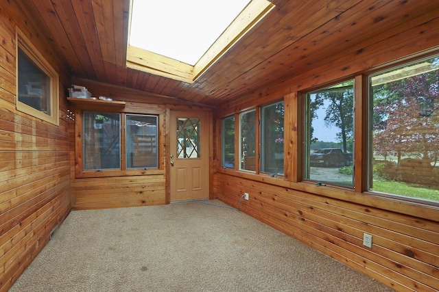 2518 Borg Rd, Delavan, WI 53115 - unfurnished sunroom featuring a skylight, carpet floors, and wooden walls