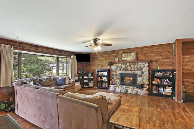 2518 Borg Rd, Delavan, WI 53115 - living area with a ceiling fan, a fireplace, and wood finished floors
