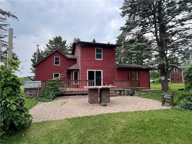 N8355 330th St, Spring Valley, WI 54767 - back of property featuring a patio area, a deck, and a lawn