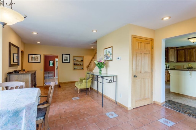 N8355 330th St, Spring Valley, WI 54767 - dining room featuring recessed lighting, light tile patterned floors, baseboards, and stairway