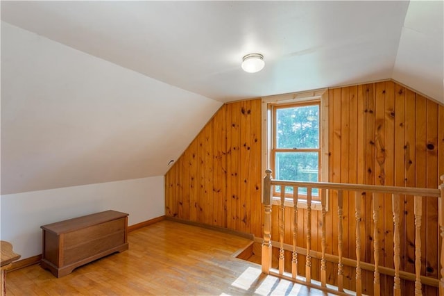 N8355 330th St, Spring Valley, WI 54767 - bonus room with lofted ceiling, wood finished floors, wood walls, and baseboards