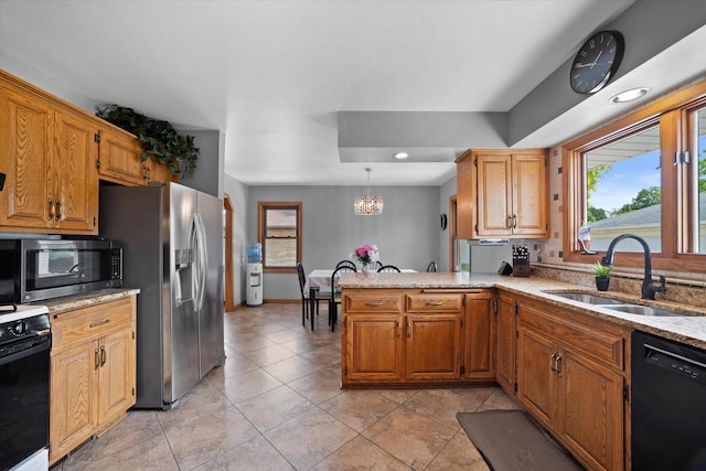 7101 W Tripoli Ave, Milwaukee, WI 53220 - kitchen featuring dishwasher, range, stainless steel fridge, plenty of natural light, and recessed lighting