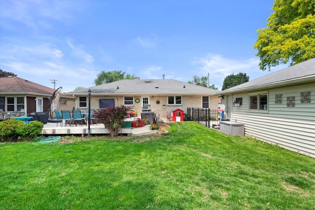 7101 W Tripoli Ave, Milwaukee, WI 53220 - back of property featuring a wooden deck