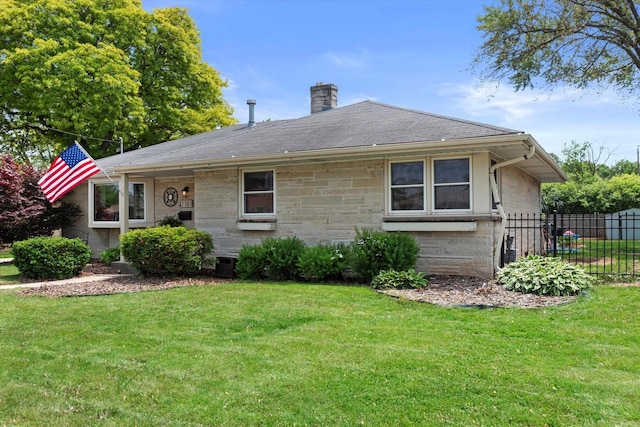 7101 W Tripoli Ave, Milwaukee, WI 53220 - view of front of house with a chimney, stone siding, and a shingled roof