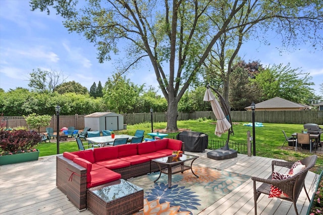 7101 W Tripoli Ave, Milwaukee, WI 53220 - wooden deck featuring outdoor dining area, a shed, and a fenced backyard