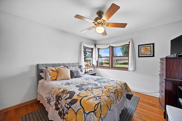 7101 W Tripoli Ave, Milwaukee, WI 53220 - bedroom featuring light wood-style flooring and a ceiling fan