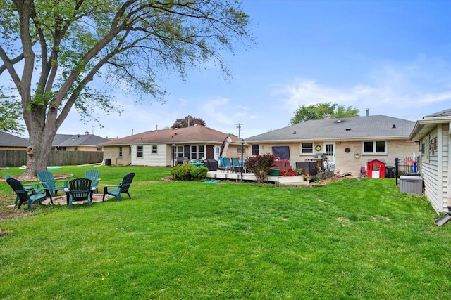 7101 W Tripoli Ave, Milwaukee, WI 53220 - rear view of house featuring a wooden deck