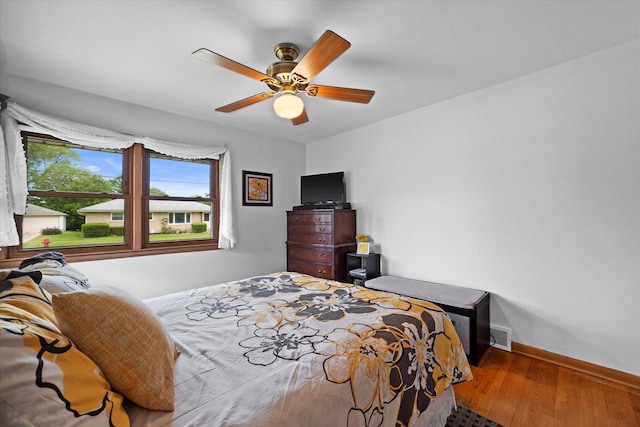 7101 W Tripoli Ave, Milwaukee, WI 53220 - bedroom with hardwood / wood-style floors and a ceiling fan