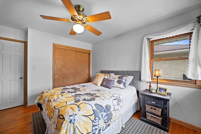 7101 W Tripoli Ave, Milwaukee, WI 53220 - bedroom with a closet, wood finished floors, and ceiling fan