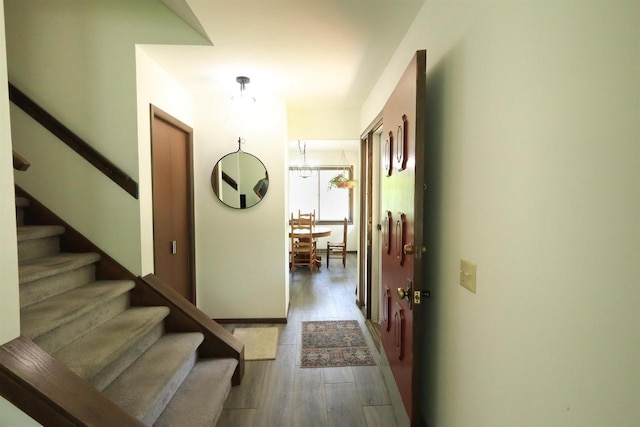 525 Walnut Grove Dr, Madison, WI 53717 - hall with stairway and wood finished floors