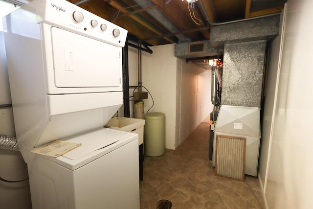 525 Walnut Grove Dr, Madison, WI 53717 - laundry area featuring stacked washer / dryer