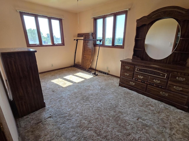 3803 State Highway 147 W, Two Rivers, WI 54241 - unfurnished bedroom featuring carpet floors and baseboards