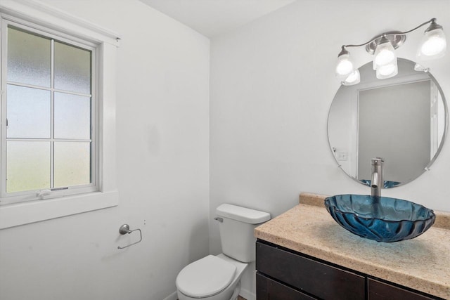 6650 N 114th St, Milwaukee, WI 53224 - half bath featuring vanity and toilet